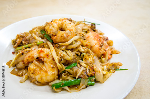 Fried Char Kway Teow is a popular food in Malaysia and Singapore. photo