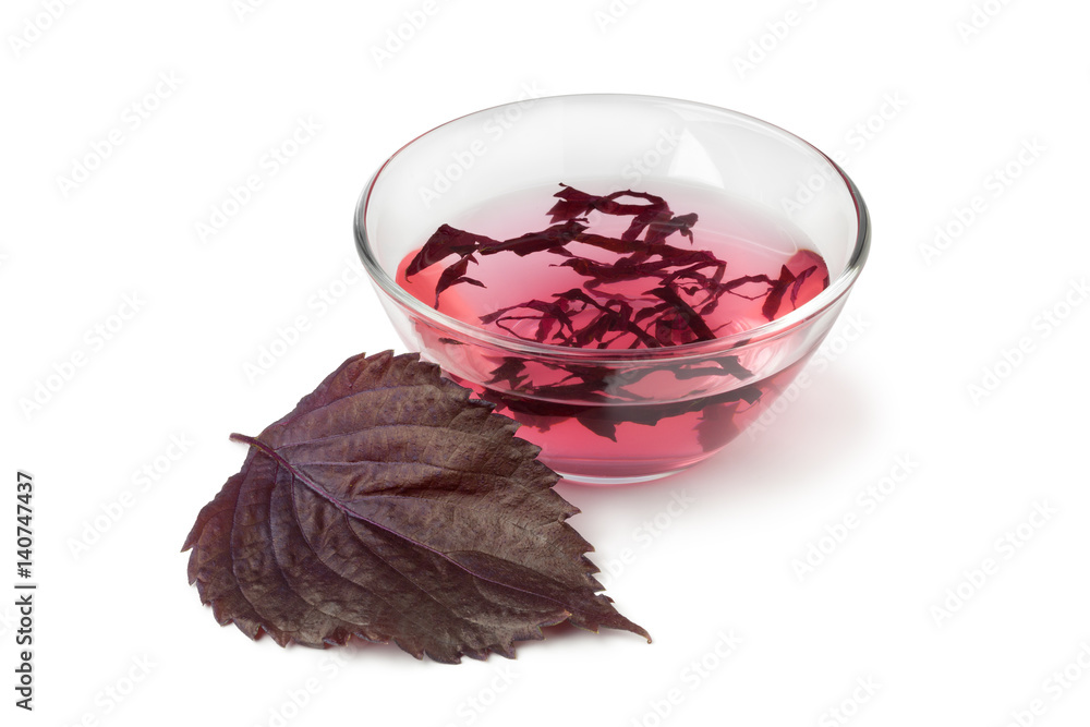 Fotografie Shiso vinegar with fresh red shiso leaf