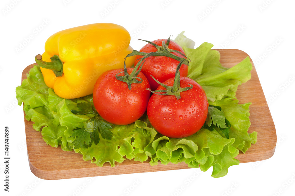 Fresh vegetables on wooden board