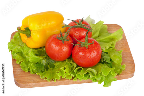 Fresh vegetables on wooden board
