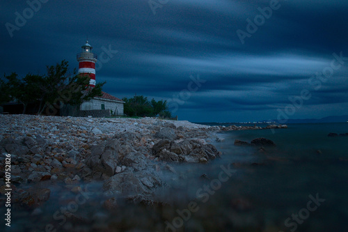 Lighthouse in the night in Kraljevica / Croatia photo