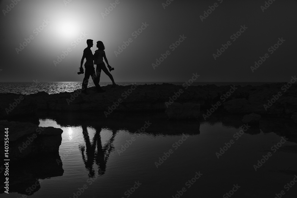 Enamored photographers silhouette