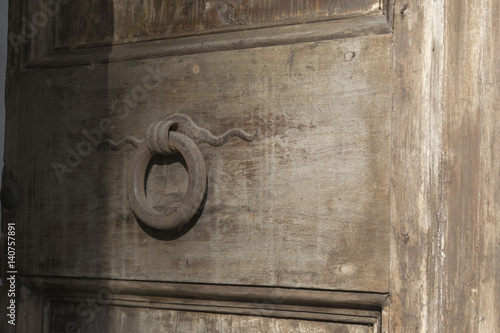 old doorway with rusted knocker