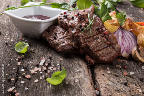 Beef steak on woode table, Fresh grilled steak with vegetable