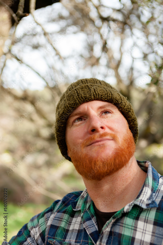 Red haired man looking up Red haired man looking up