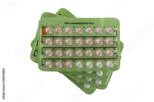 Stack of Birth control pill in 28 pill packages. There are 24 hormone pills, 4 placebo non-hormone pills, isolated on white background