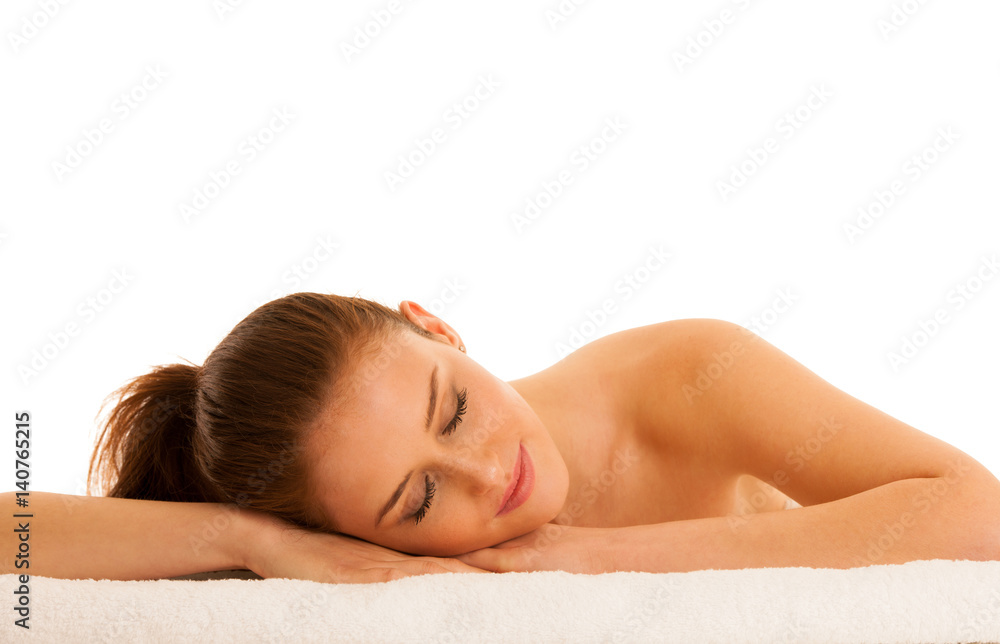 woman rests on white towel - conceptual photo for skin care and spa woman rests on white towel - conceptual photo for skin care and spa