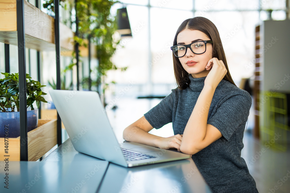 Student work process concept. Woman working university project with generic design laptop. Student work process concept. Woman working university project with generic design laptop.