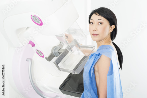 Portrait Of Woman Undergoing Mammogram X-ray Test