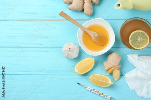 Natural ingredients for cough remedy on wooden background