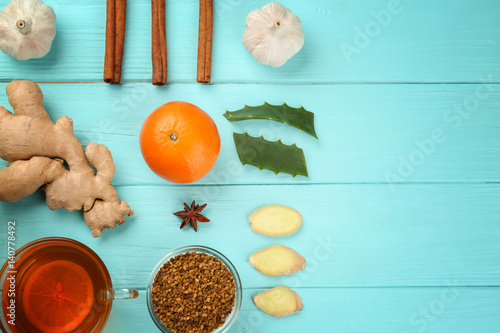 Natural ingredients for cough remedy on wooden background
