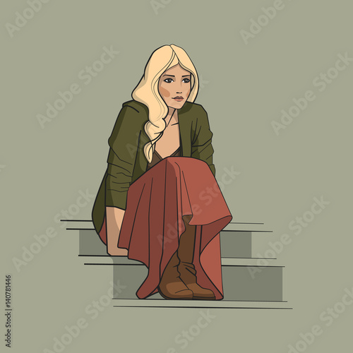 Girl in long skirt sitting on the stairs