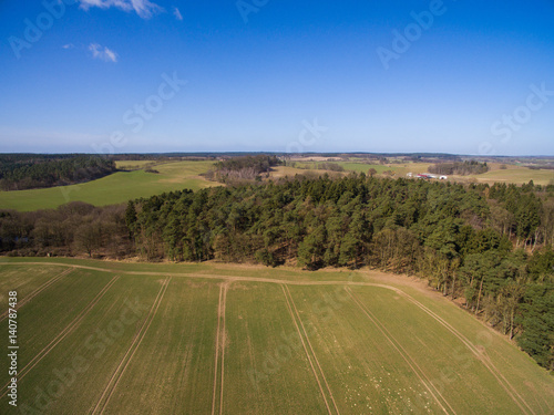 aerial view of forest an blue sky in germany