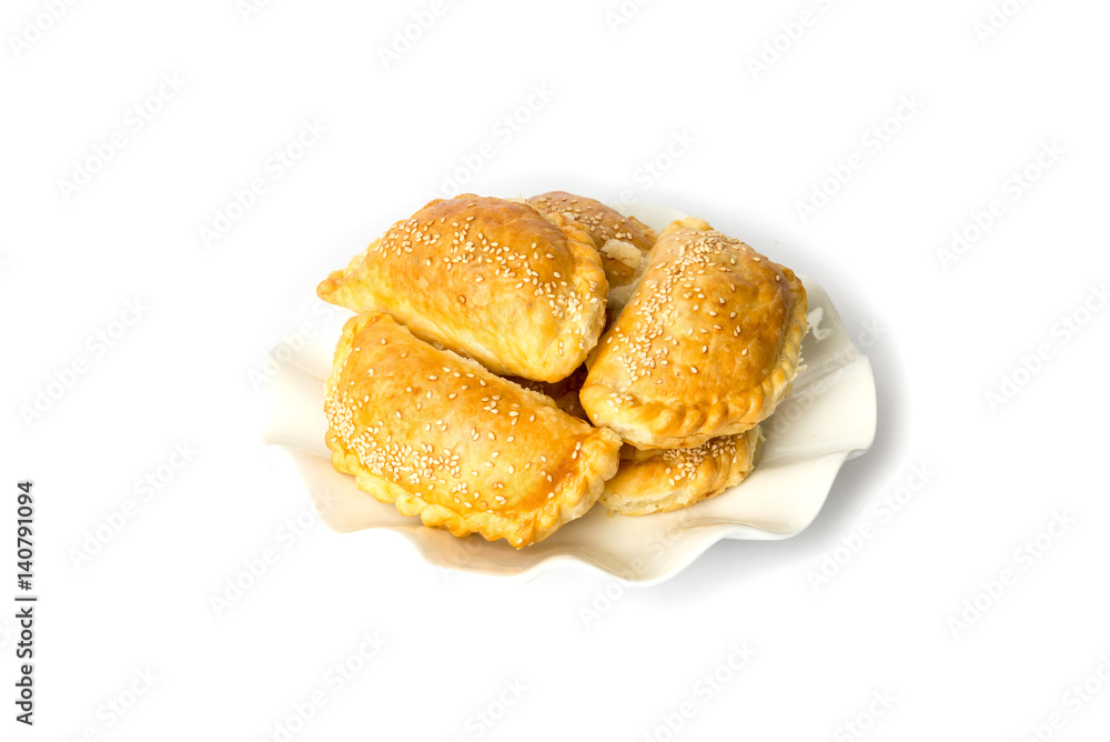 Heap of small chebureks isolated on white background Heap of small chebureks isolated on white background
