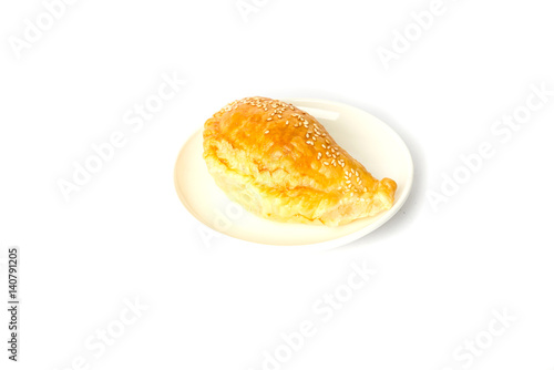 Heap of small chebureks isolated on white background photo