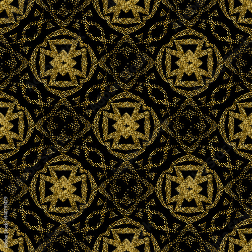 Seamless golden ethnic pattern of dots. A pockmarked background of geometric shapes and stylized plant elements.