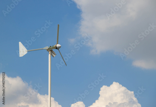 Electric wind turbine with blue sky © Voy_ager