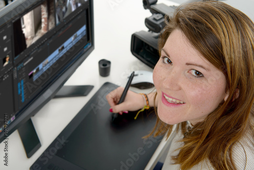 young woman designer using graphics tablet