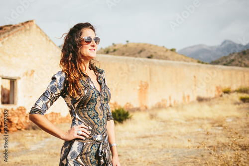 Girl in wonderful dress in Spain at the sea