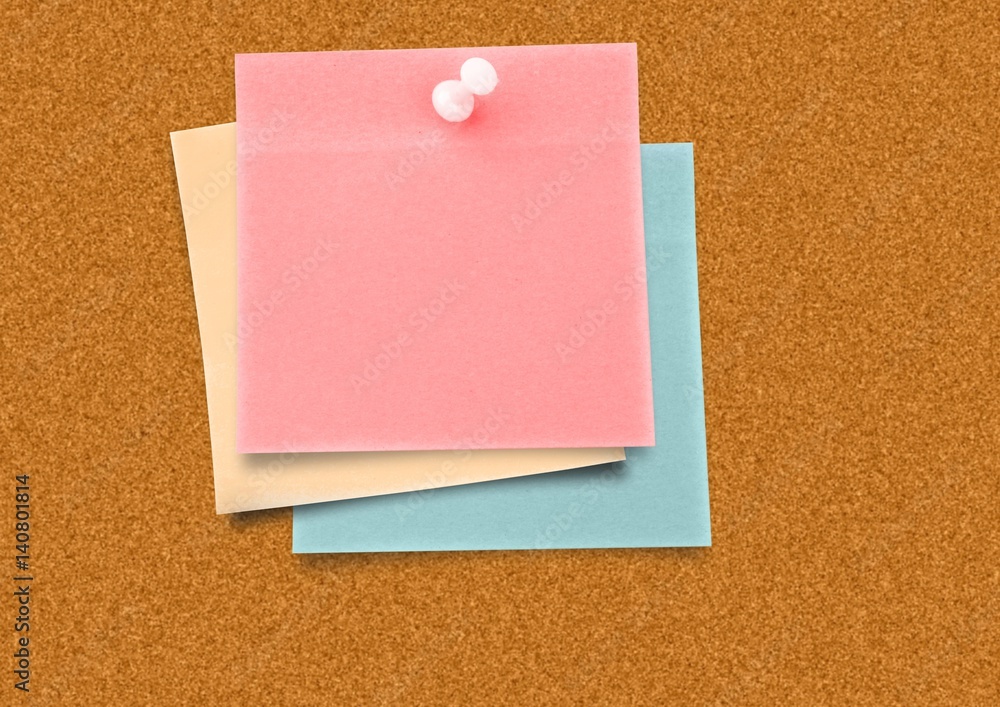Sticky Note against a board Sticky Note against a board