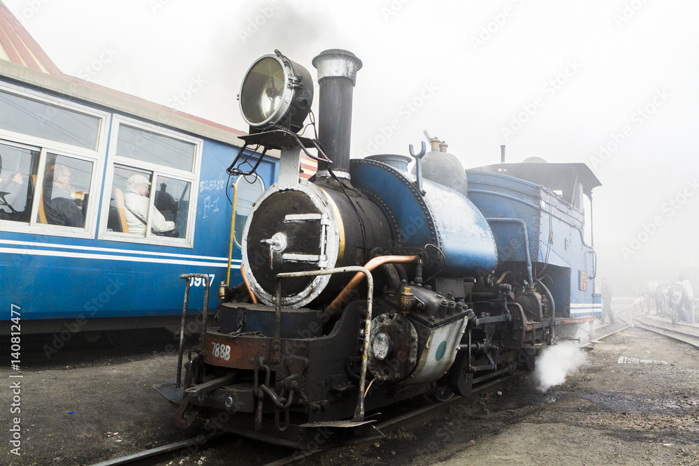Obraz premium DARJEELING, INDIA - 2017 MARCH 4 : The British-built famous mountain railway, the so-called Toy Train on April 14, 2014 in Darjeeling, India. It is part of the World Heritage.