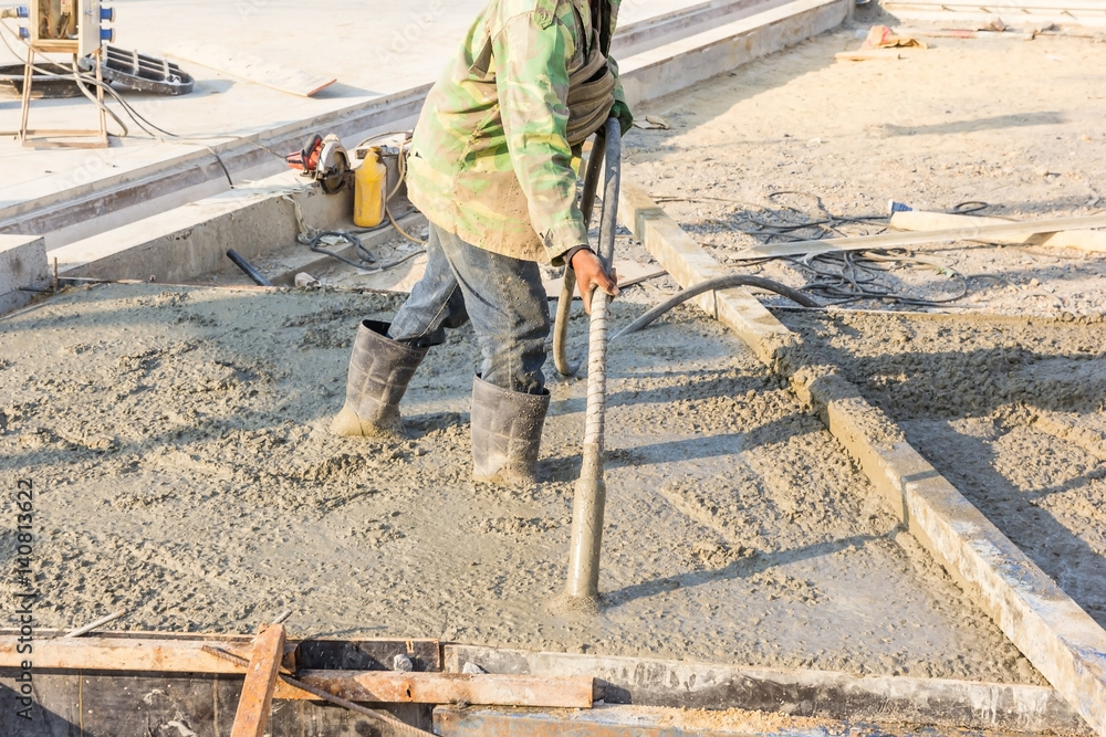 Concrete pouring during commercial concreting floors of buildings in construction site. Concrete pouring during commercial concreting floors of buildings in construction site.