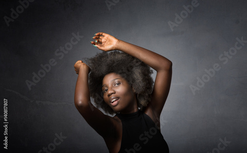 african girl clubbing in abstract room