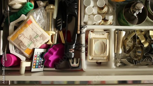 cutlery drawer opens full  utensils, overhead view  kitchen 