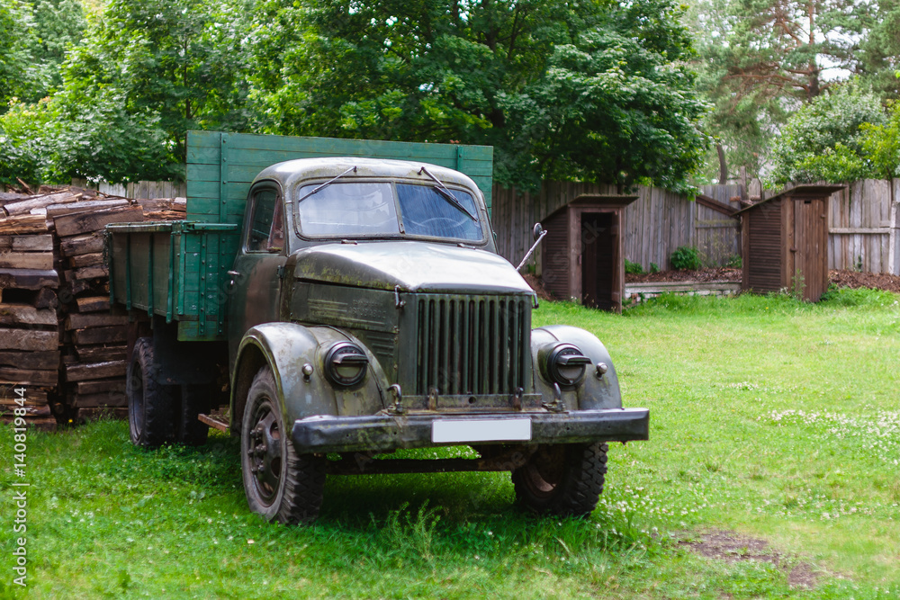 The old Soviet lorry in village The old Soviet lorry in village