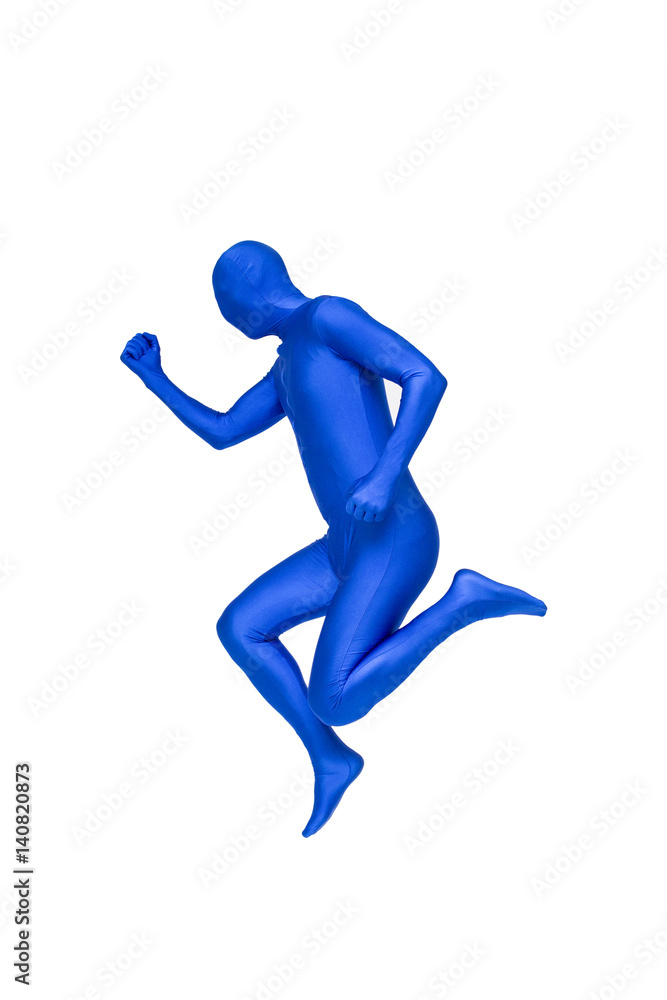 Mysterious blue man in costume jumpping