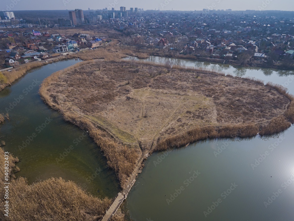 Autumn park. Pond in the autumn park. Aerial view.