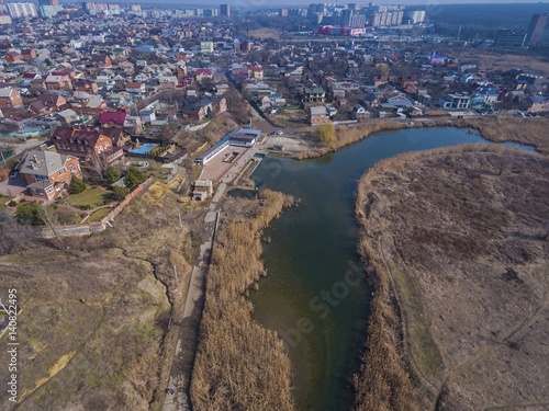 Autumn park. Pond in the autumn park. Aerial view.