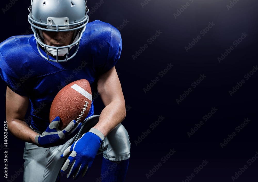 American player posing with rugby