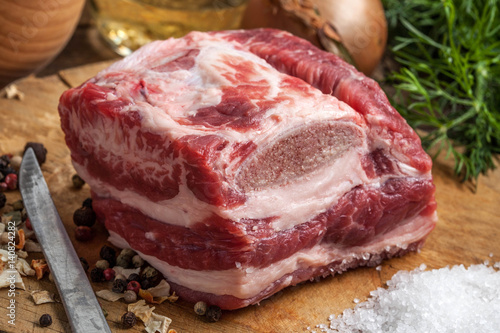 Raw brisket with bone.