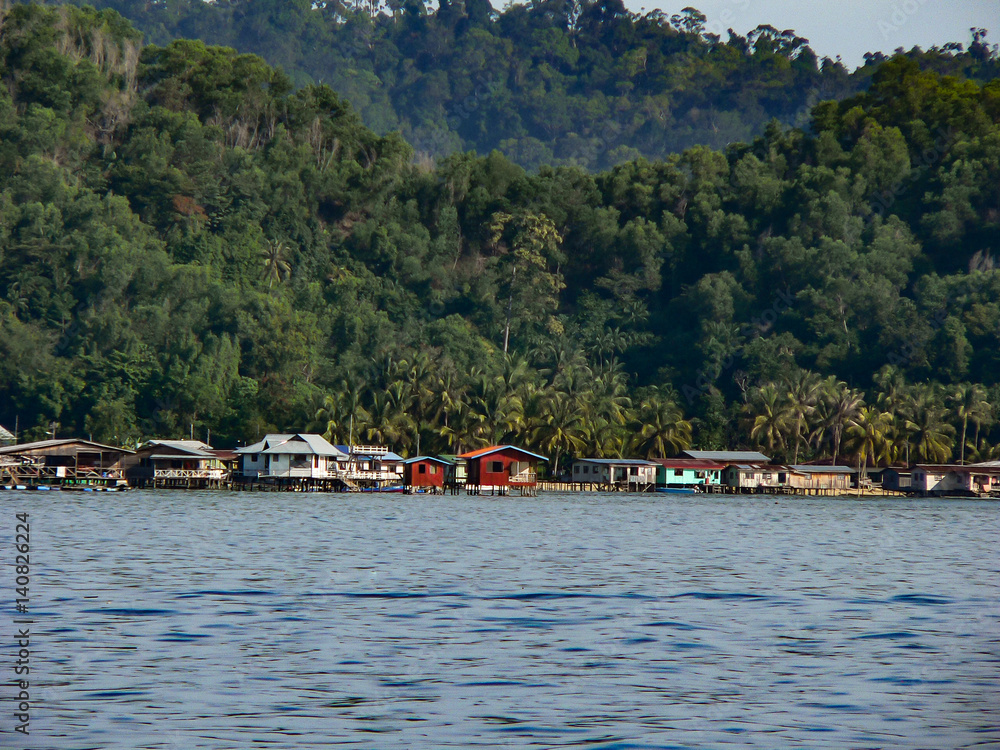 Fishing huts houseboats over sea in Borneo Malaysia