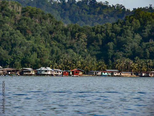 Fishing huts houseboats over sea in Borneo Malaysia