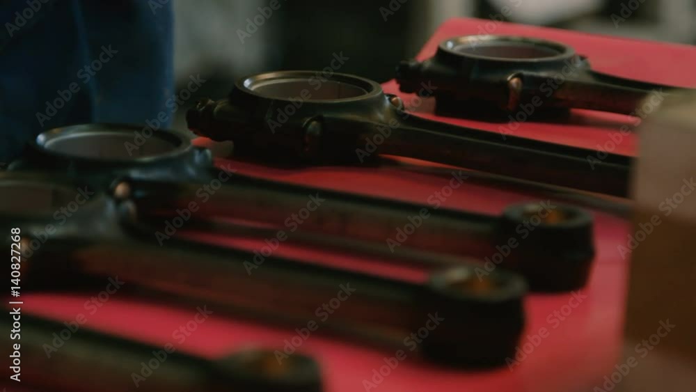 Connecting Rods in a Workshop. Camera Moving Right Connecting Rods in a Workshop. Camera Moving Right