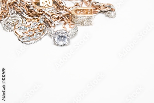 Beautiful golden jewelry. Many fashionable women's jewelry. Macro shot.