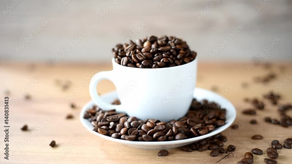 coffee cup filled by coffee beans coffee cup filled by coffee beans