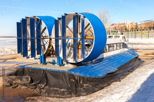 Turbo-prop engine of a naval hovercraft on the ice of the frozen river