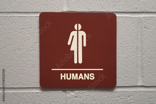 Close up of gender neutral restroom sign
