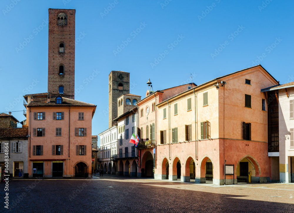 Piazza Risorgimento, main square of Alba (Piedmont, Italy) with Town Hall and medieval towers