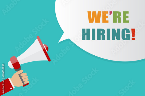 Hand holding Megaphone with speech bubble on blue background with words we're hiring, vector illustration