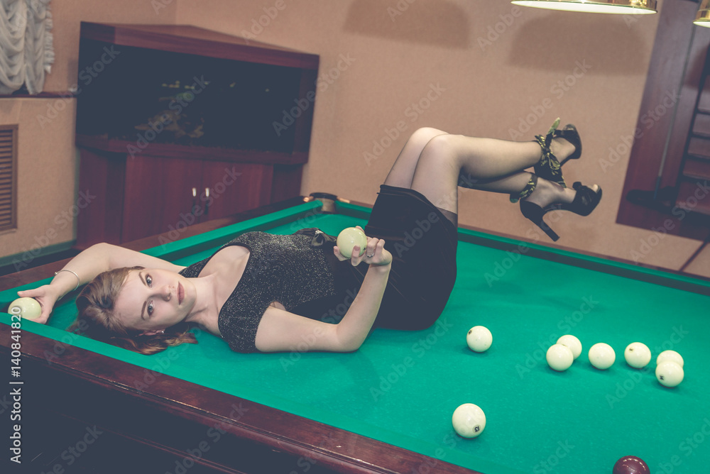 Beautiful young girl playing billiards, sexy woman in billiard room, pool  Stock Photo | Adobe Stock