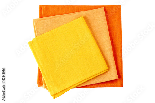 Three colorful textile napkins on white