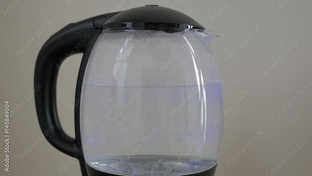 Closeup shot of Boiling water in a kitchen pot. Boil water in an
