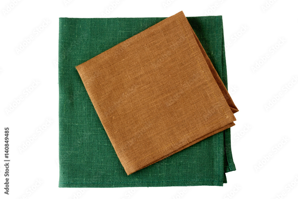 Fototapeta premium Two textile napkins, brown and green, on white