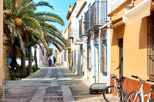 Foto Charming narrow street in the Island of Tabarca. Spain