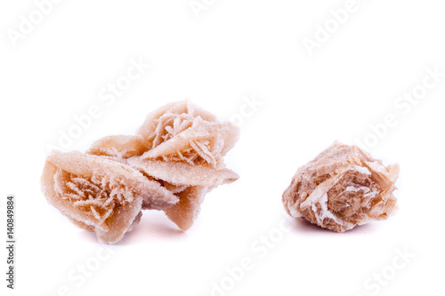 Macro mineral stone Rose winds on a white background photo