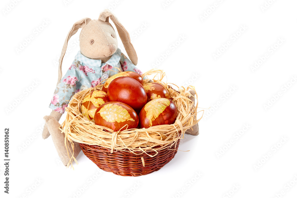 Easter bunny and basket woth decorated eggs on white Easter bunny and basket woth decorated eggs on white